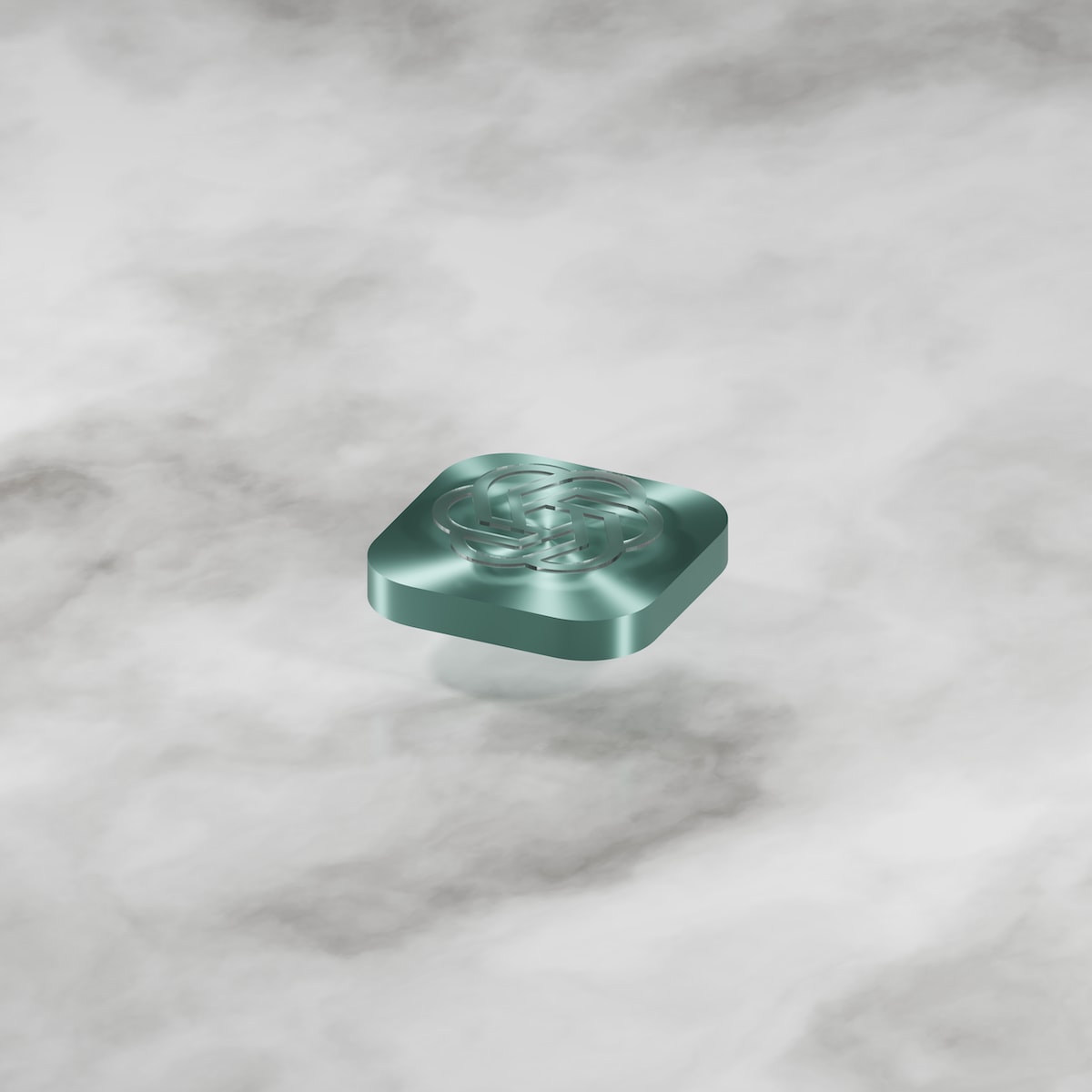 a square object sitting on a marble surface