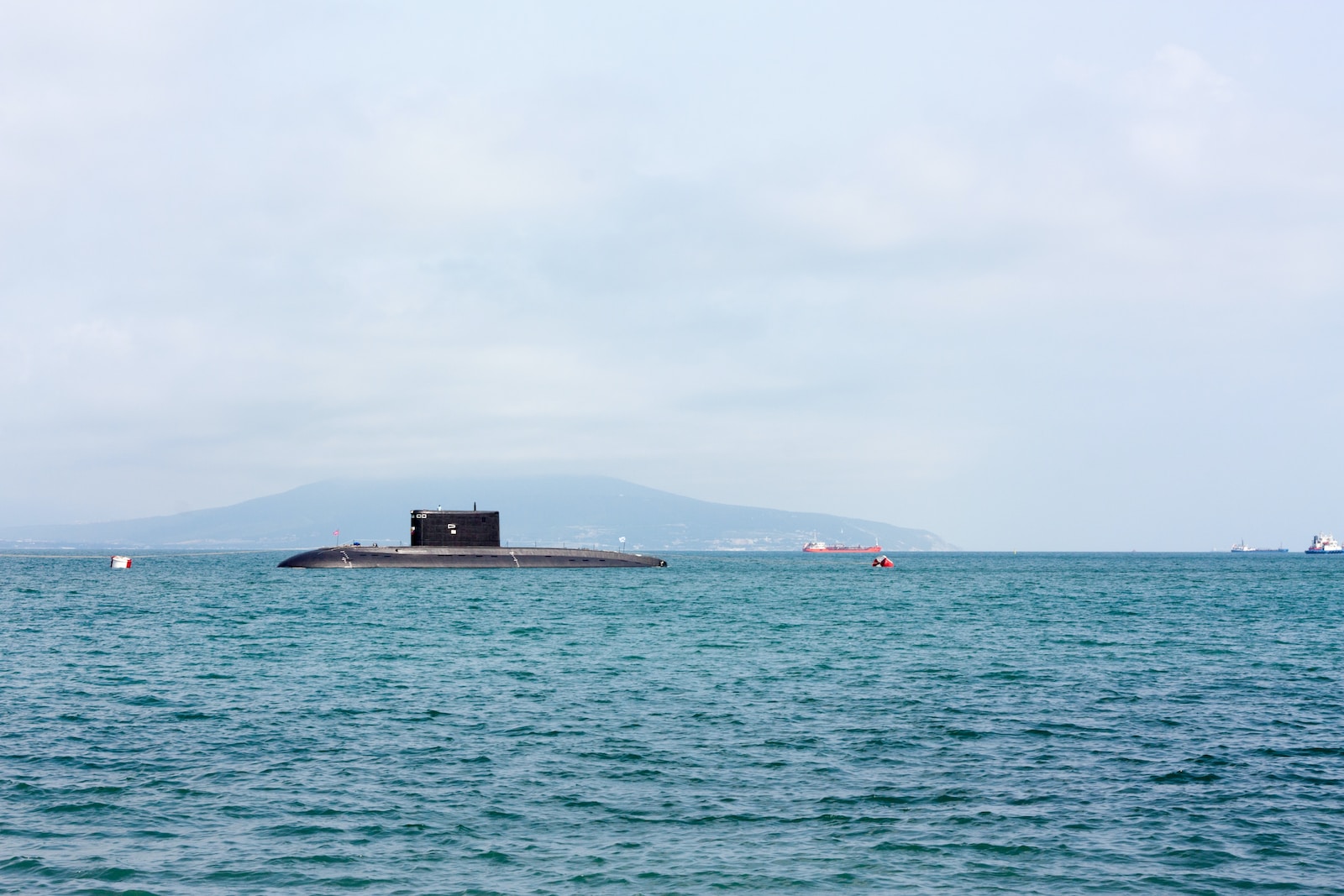 a submarine floating on top of a large body of water